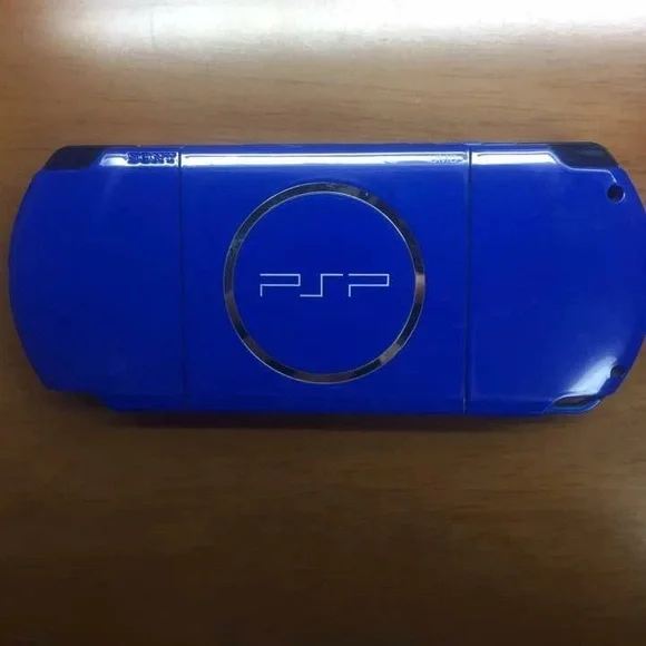 Sony White and Blue Handheld Gaming Console